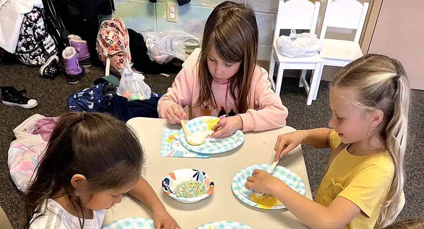 Girls Frosting Cookies